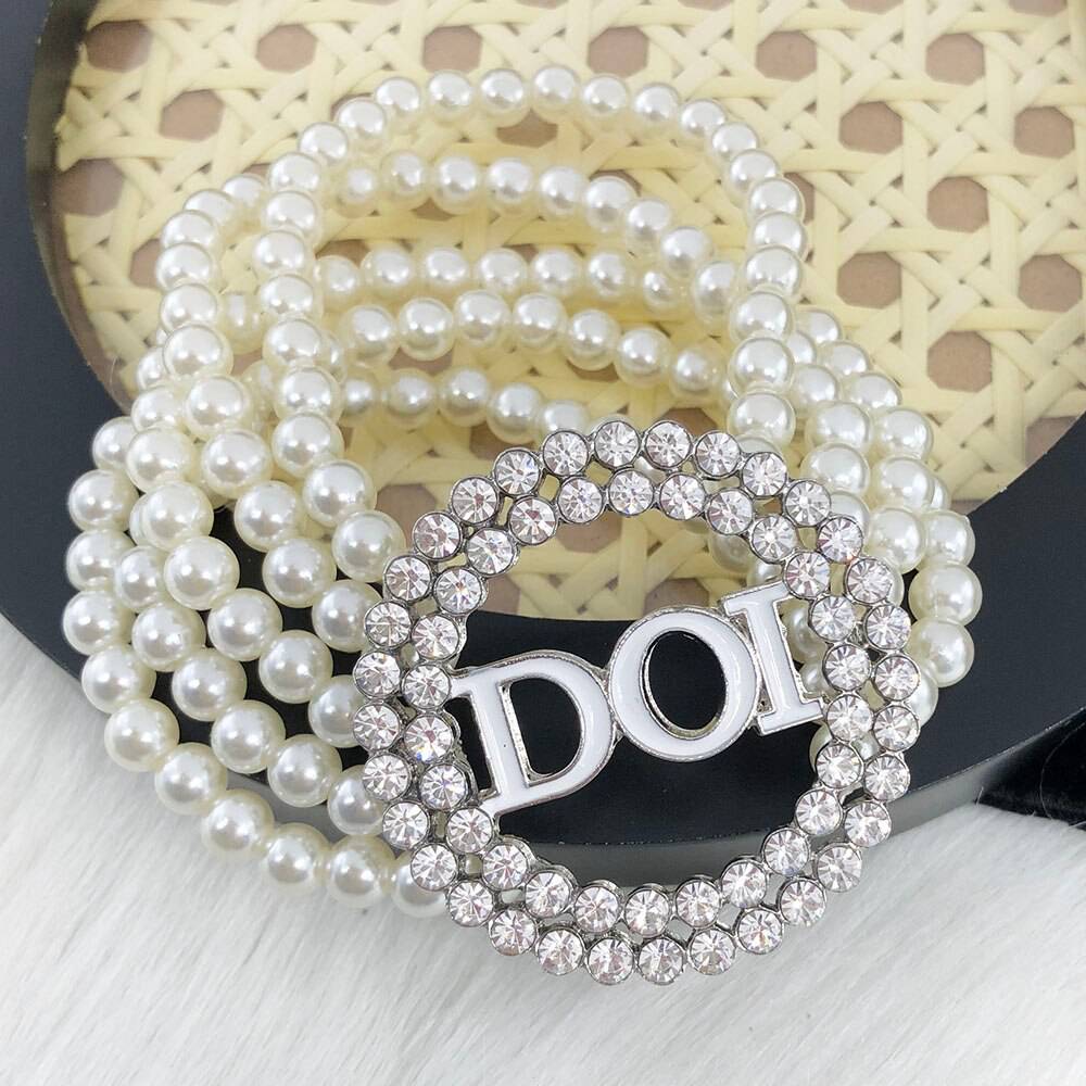 PHA DOI Bracelet - White Pearls & Charm